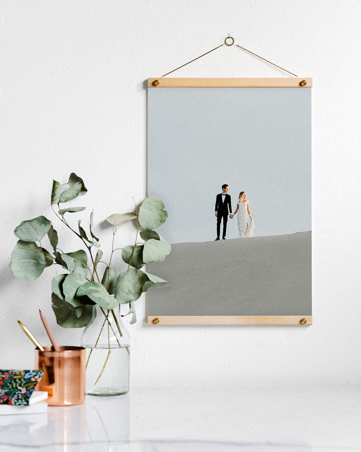 Wooden photo hanger with photo of couple on wedding day
