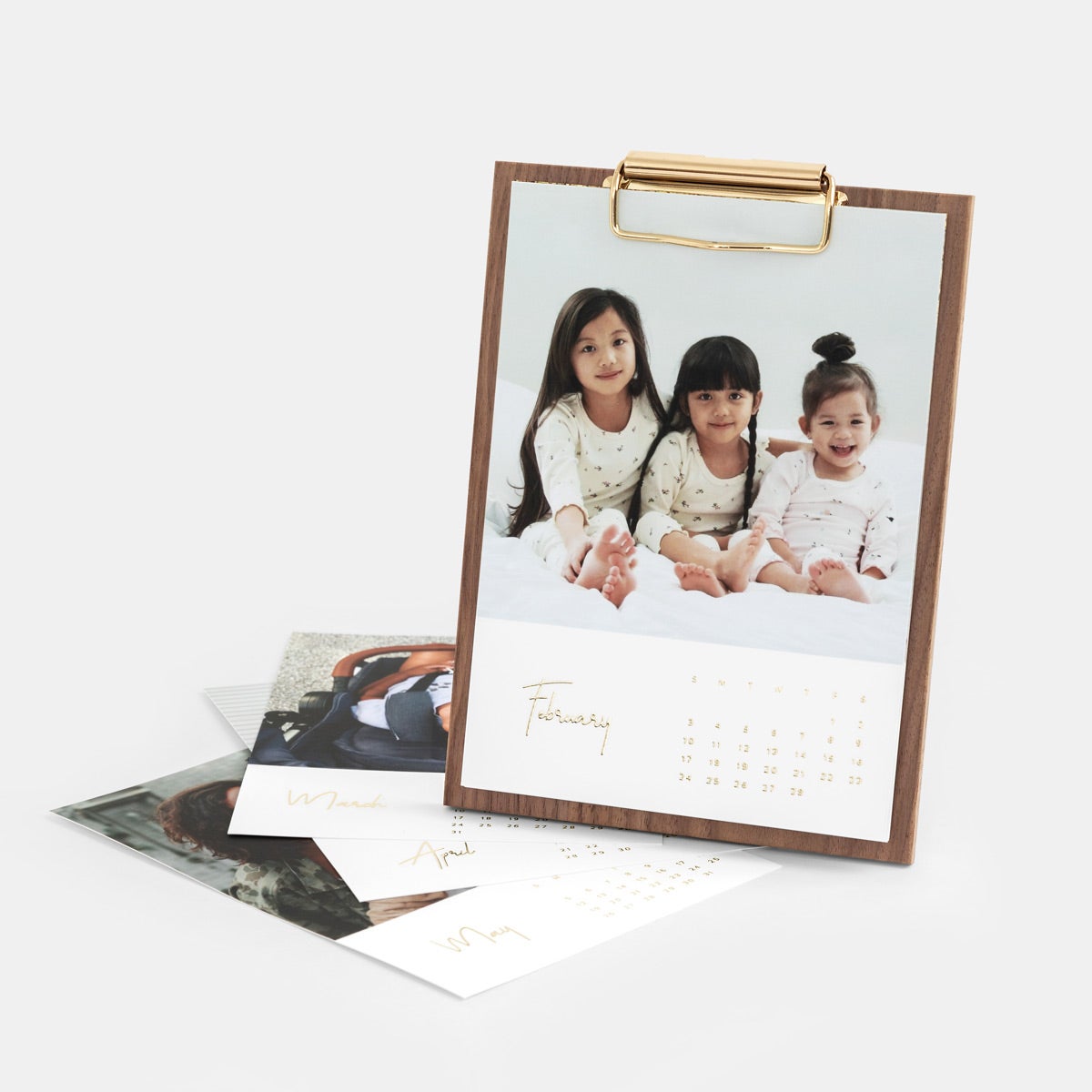 walnut desk calendar with photo of children