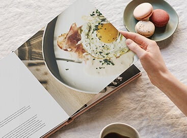 Cookbook opened to breakfast recipe