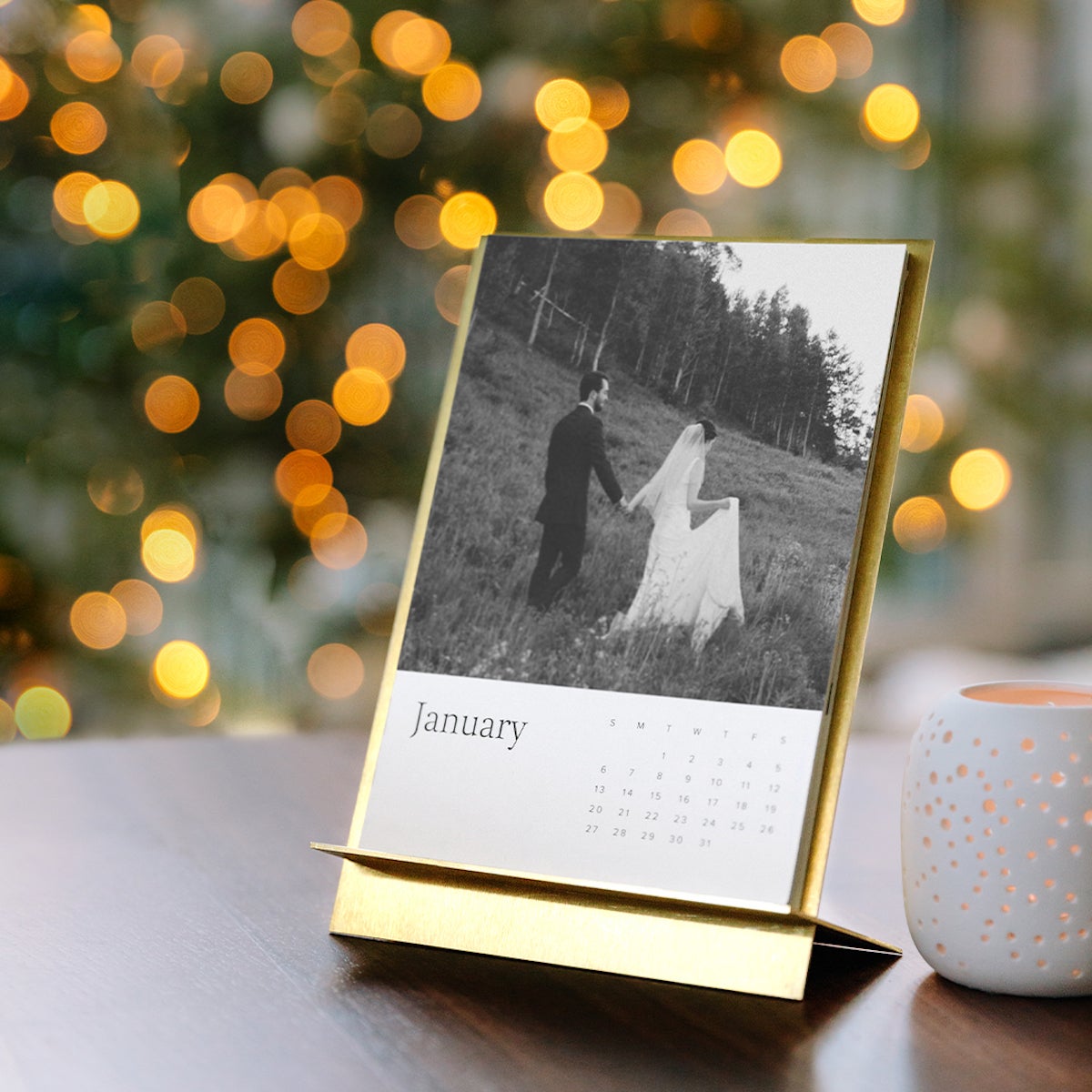 Brass Easel Calendar with photo of married couple in front of tree with string lights