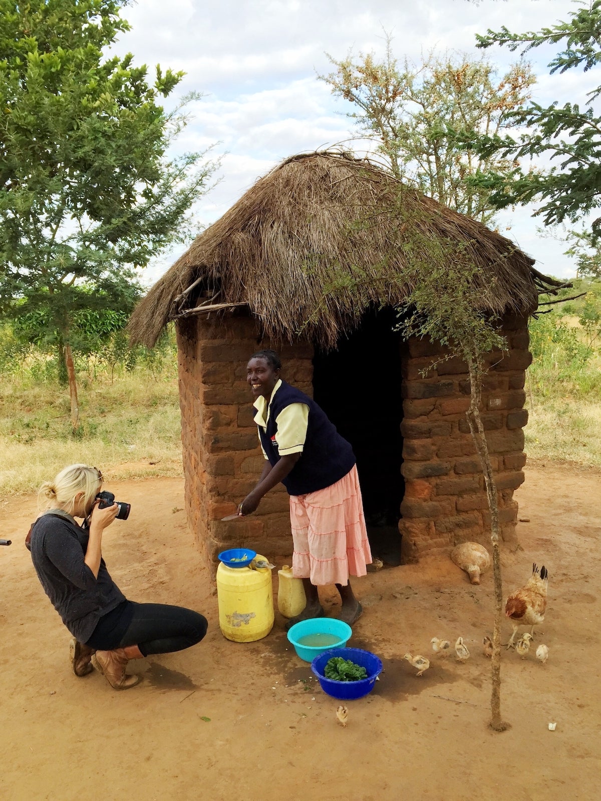 Esther Havens photographing a Kenyan farmer