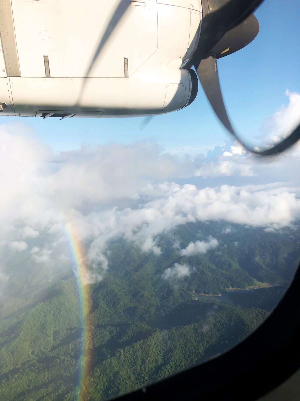 Photo of rainbow taken from airplane window