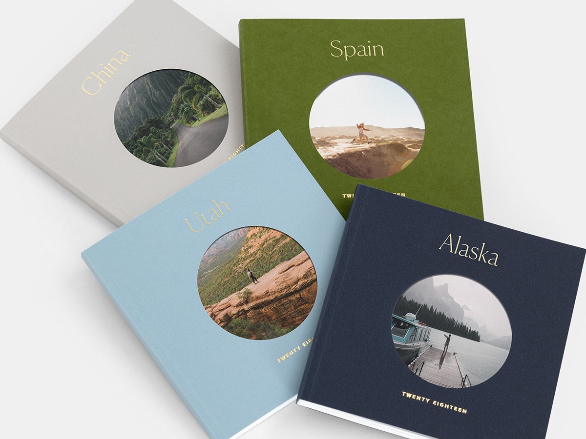 Four Color Series Photo Books with titles representing different travel destinations