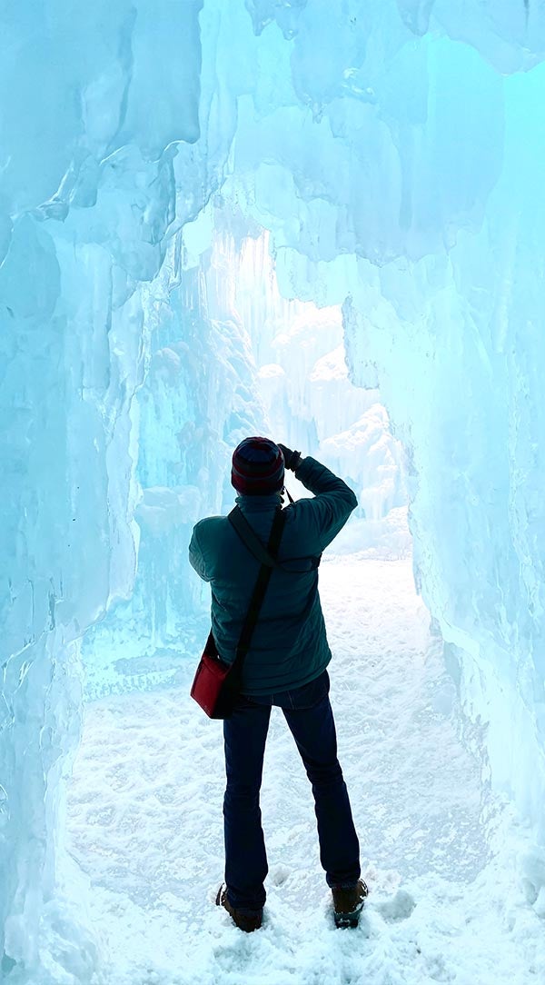 Edited photo of photographer standing in ice cave