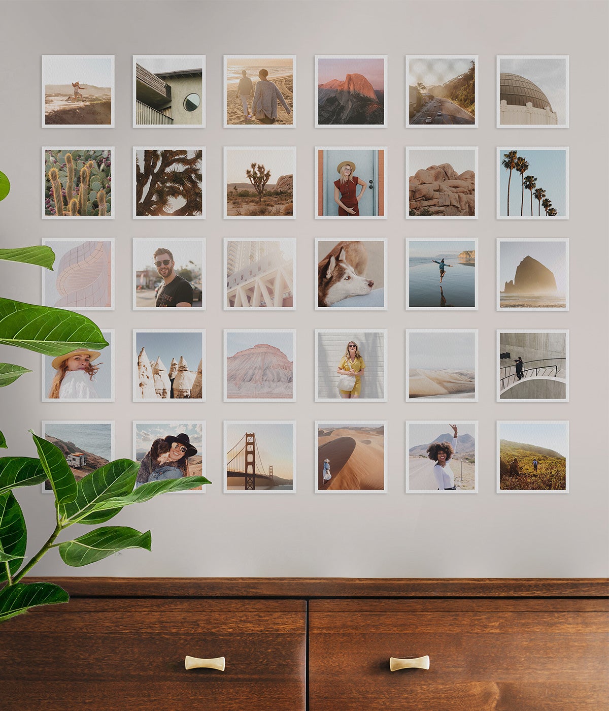 Grid of square photo prints on wall of home