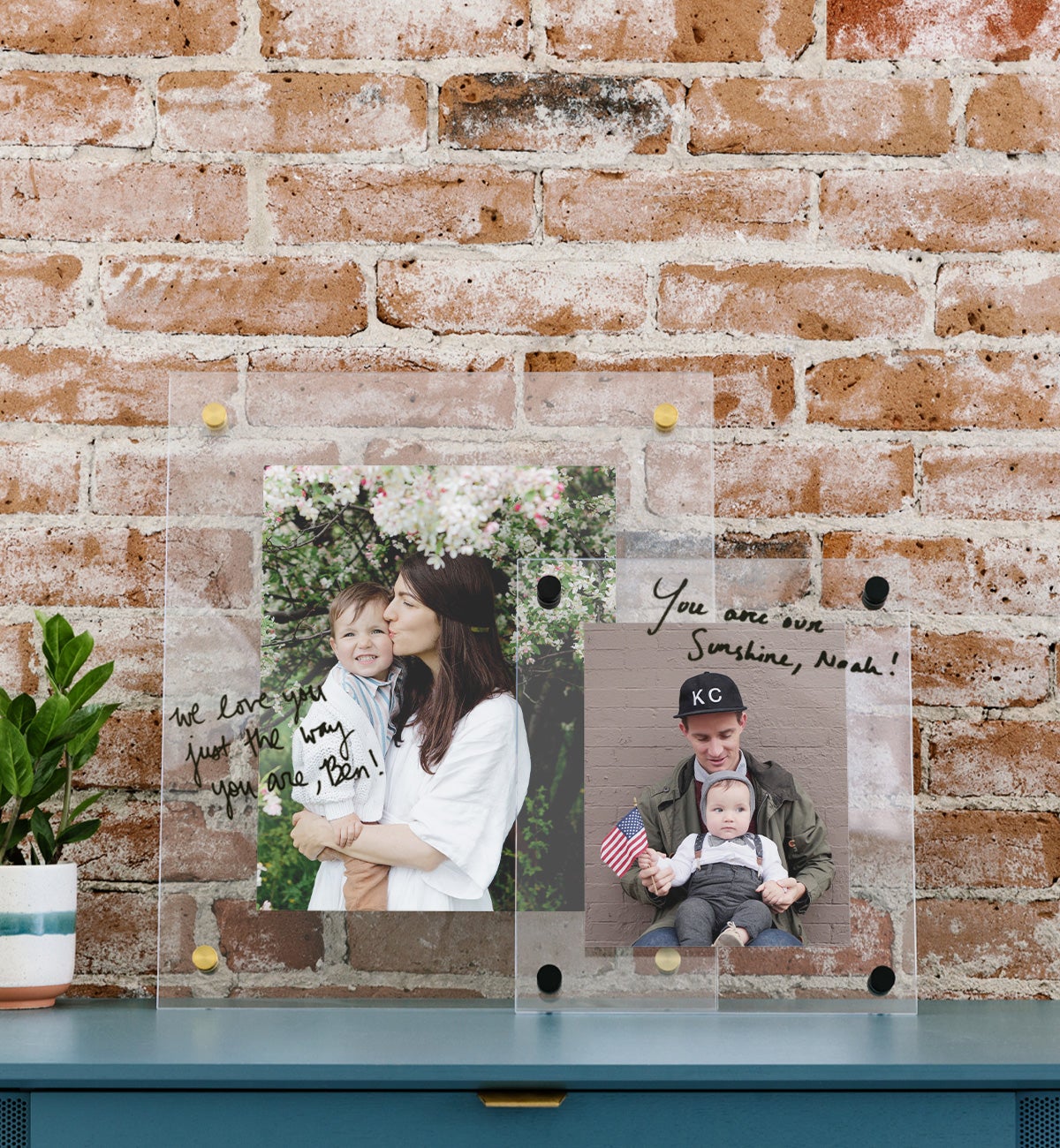 Floating frames with writing on them resting on a ledge