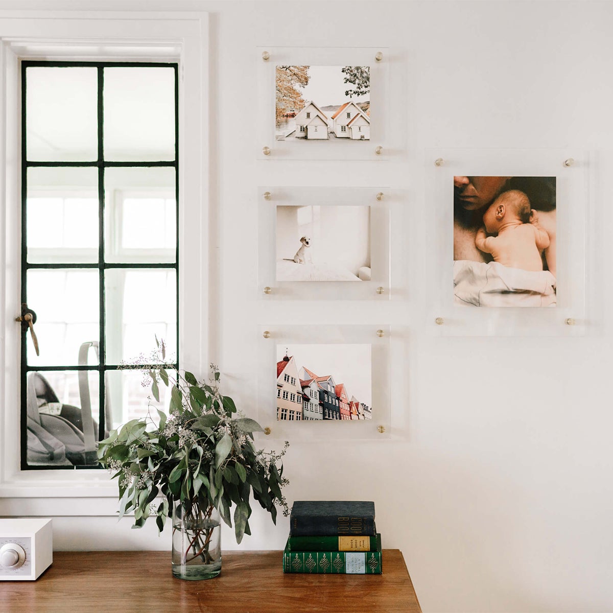 Photo by Kate Arends of four Floating Frames hung on wall