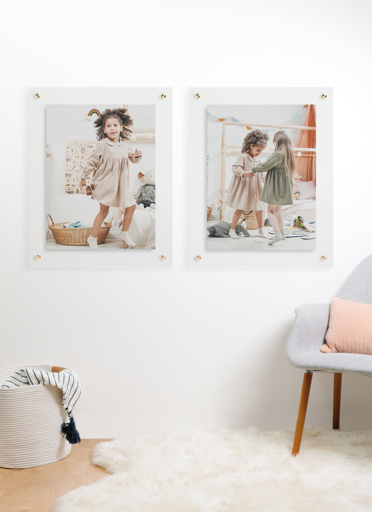 Two large Artifact Uprising Floating Frames on wall featuring photo of little girl