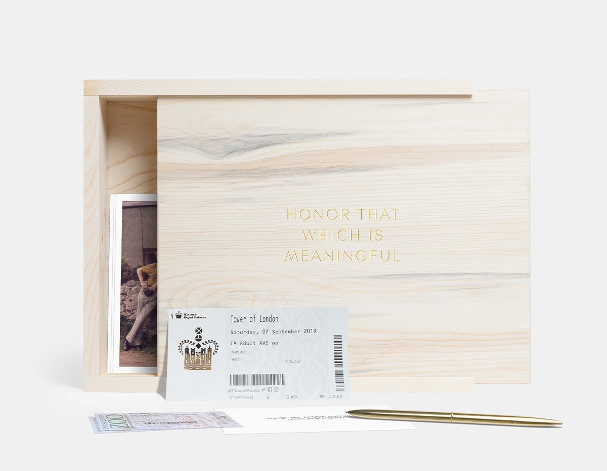 engraved wooden box with ticket stubs