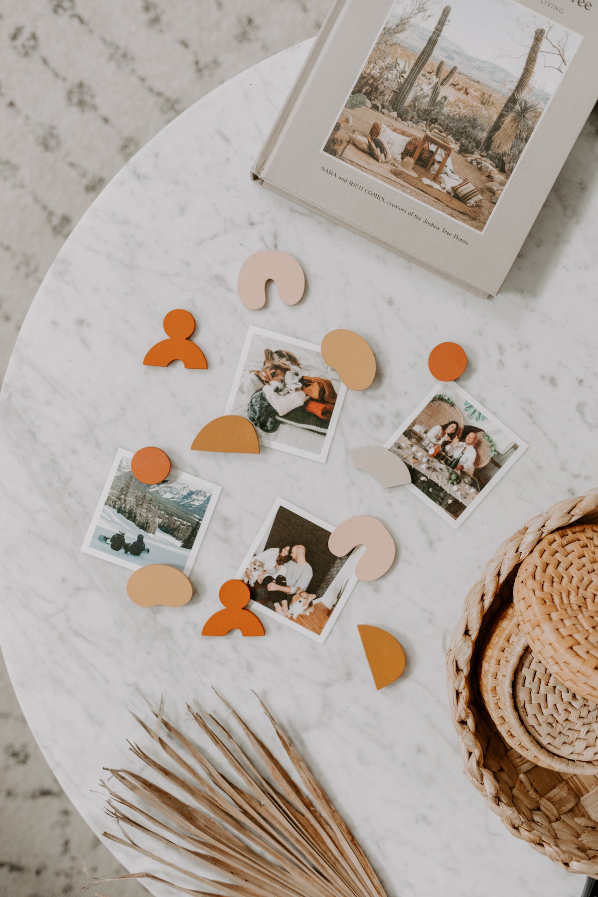 Assortment of photos on a marble table