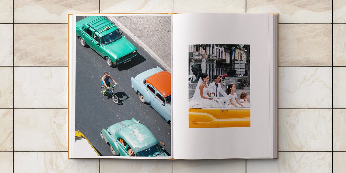 Cuba album opened up to image of family riding in classic convertible