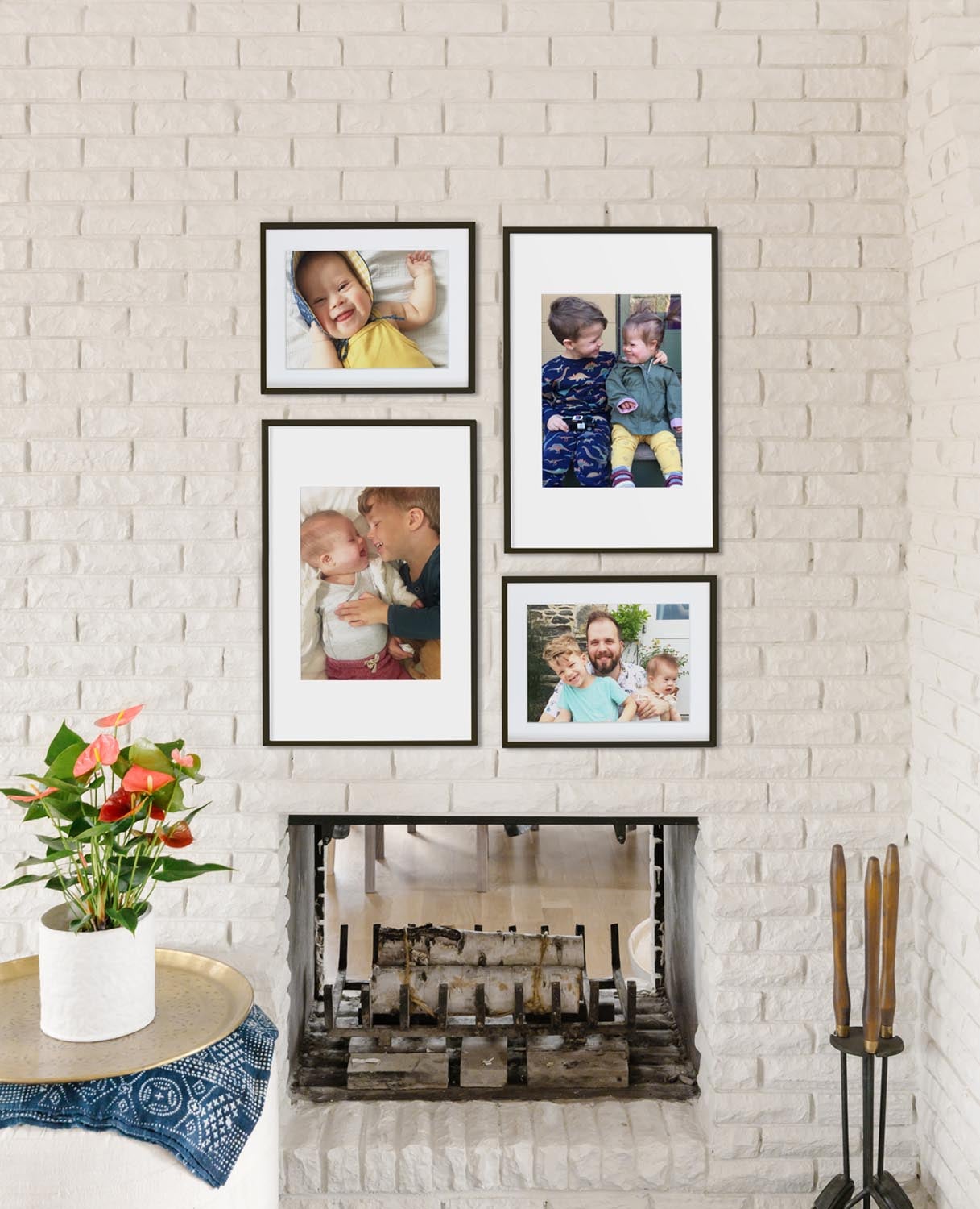 Two-column gallery wall with frames in alternating sizes