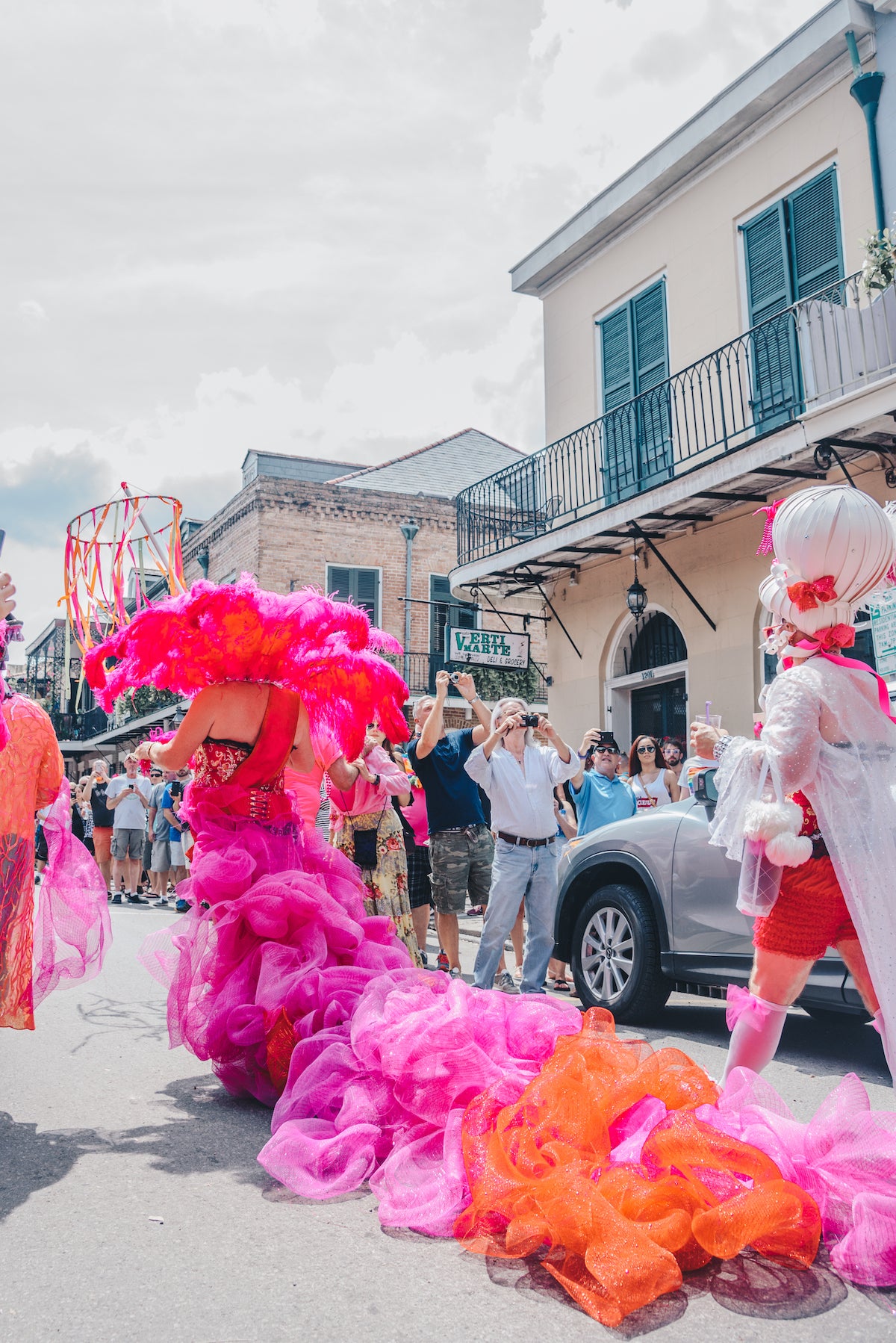 A parade with participant wearing elaborate costumes