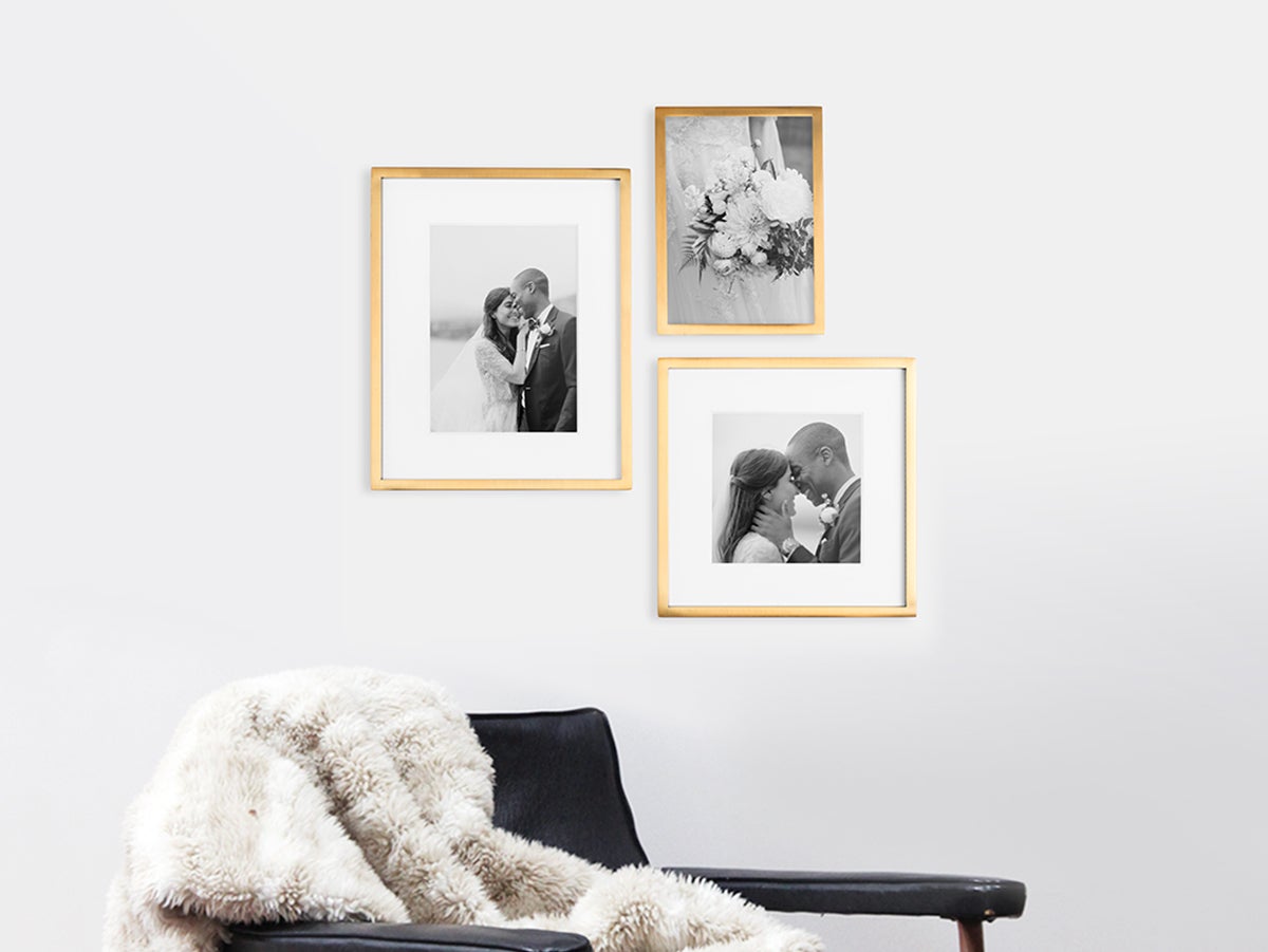 Black and white gallery wall with wedding photos