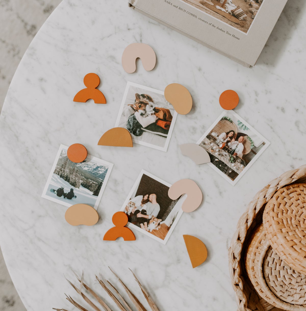 Square prints on table with cute handmade magnets