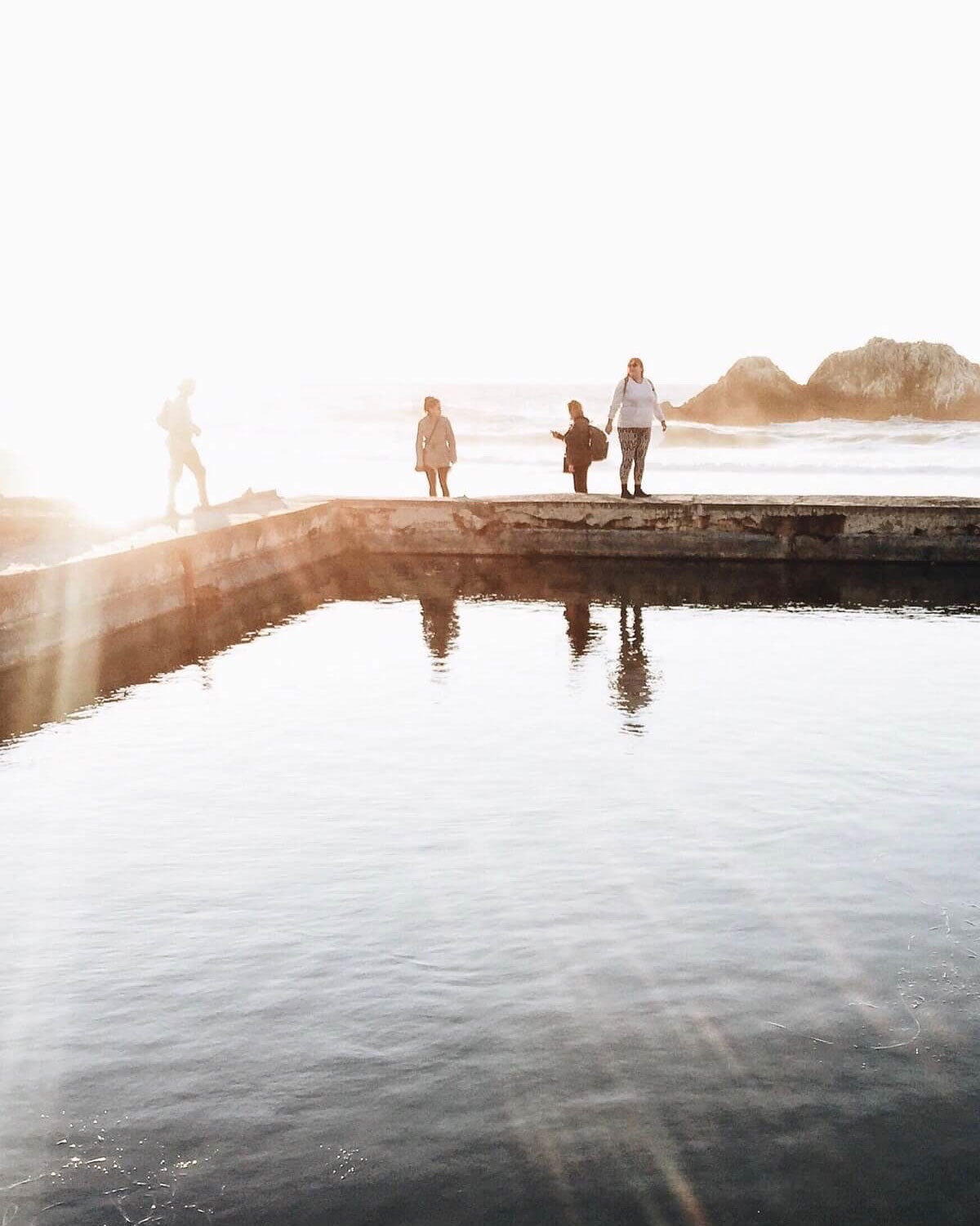 Family walking along the coast