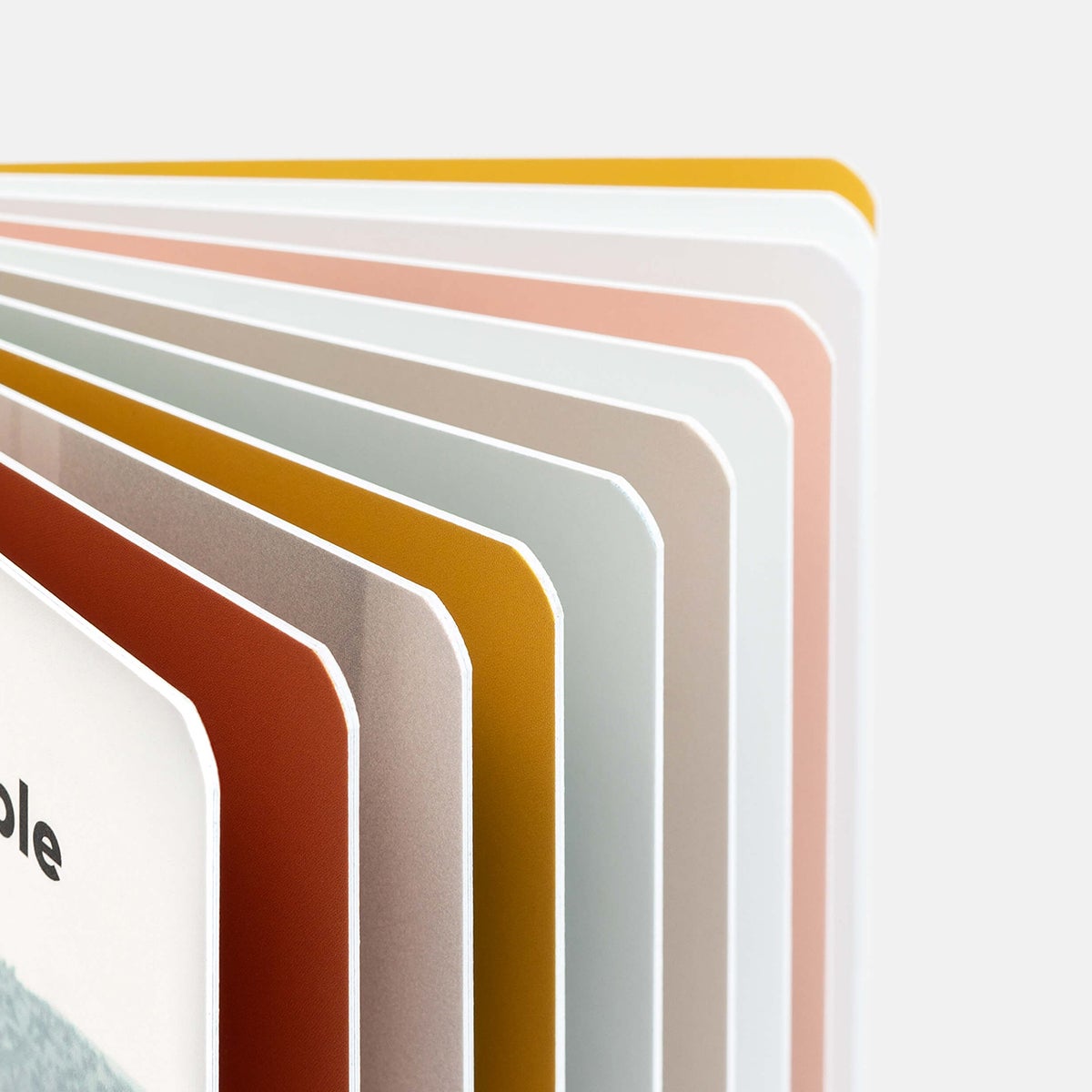 Zoomed in on ultra-thick pages and rounded corners of the Baby Board Book