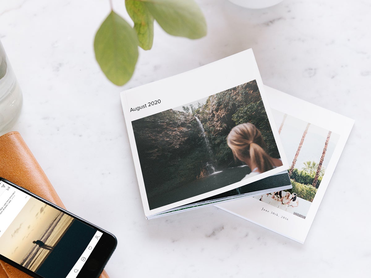 Instagram-Friendly Photo Book with woman in front of waterfall on cover