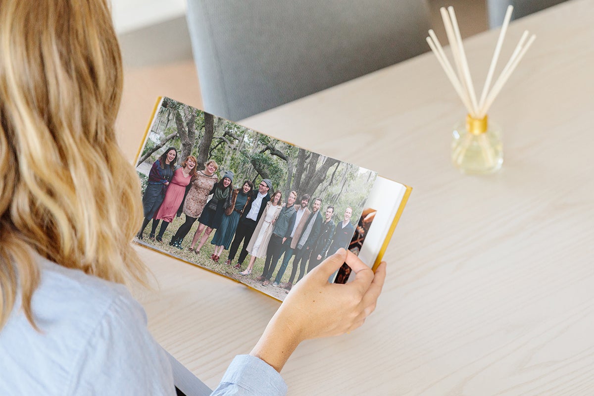 Everyday Photo Book opened to two-page family photo of all the cousins