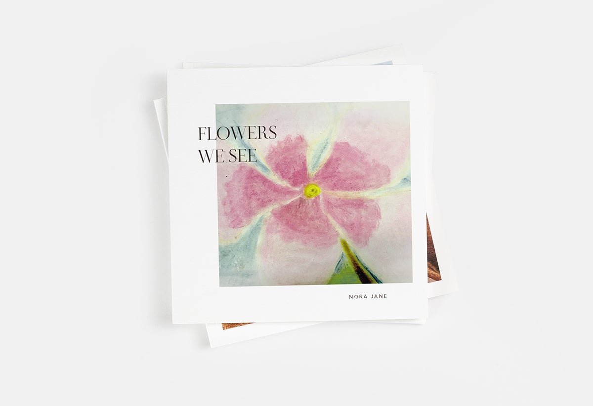 Softcover Photo Book with child's drawing of a flower on the cover