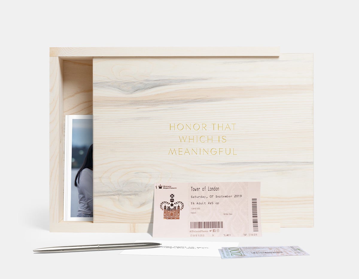 Artifact Uprising Wooden Quote Box with ticket stubs and photo prints inside