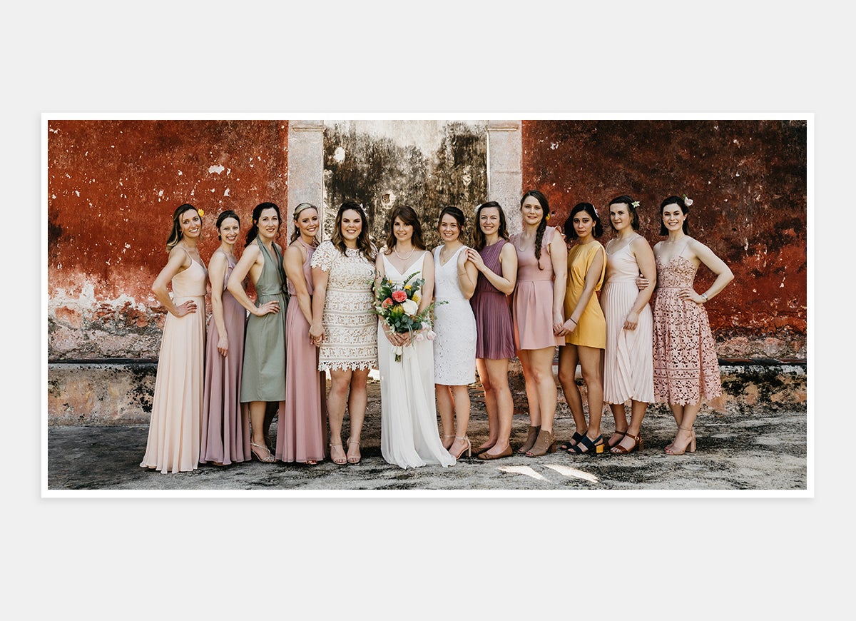 Two-page photo of bridal party in wedding album