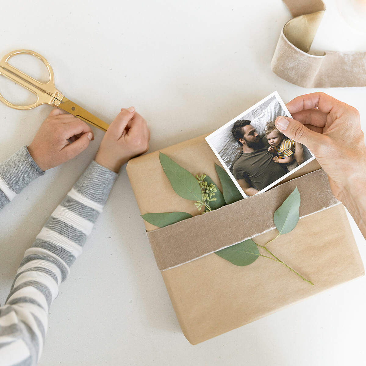 Gift wrapped with Artifact Uprising photo print and botanicals