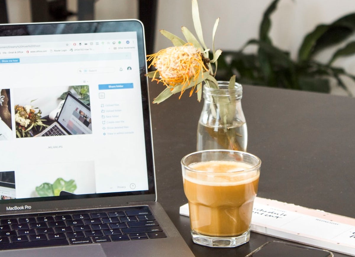 Cortado next to laptop