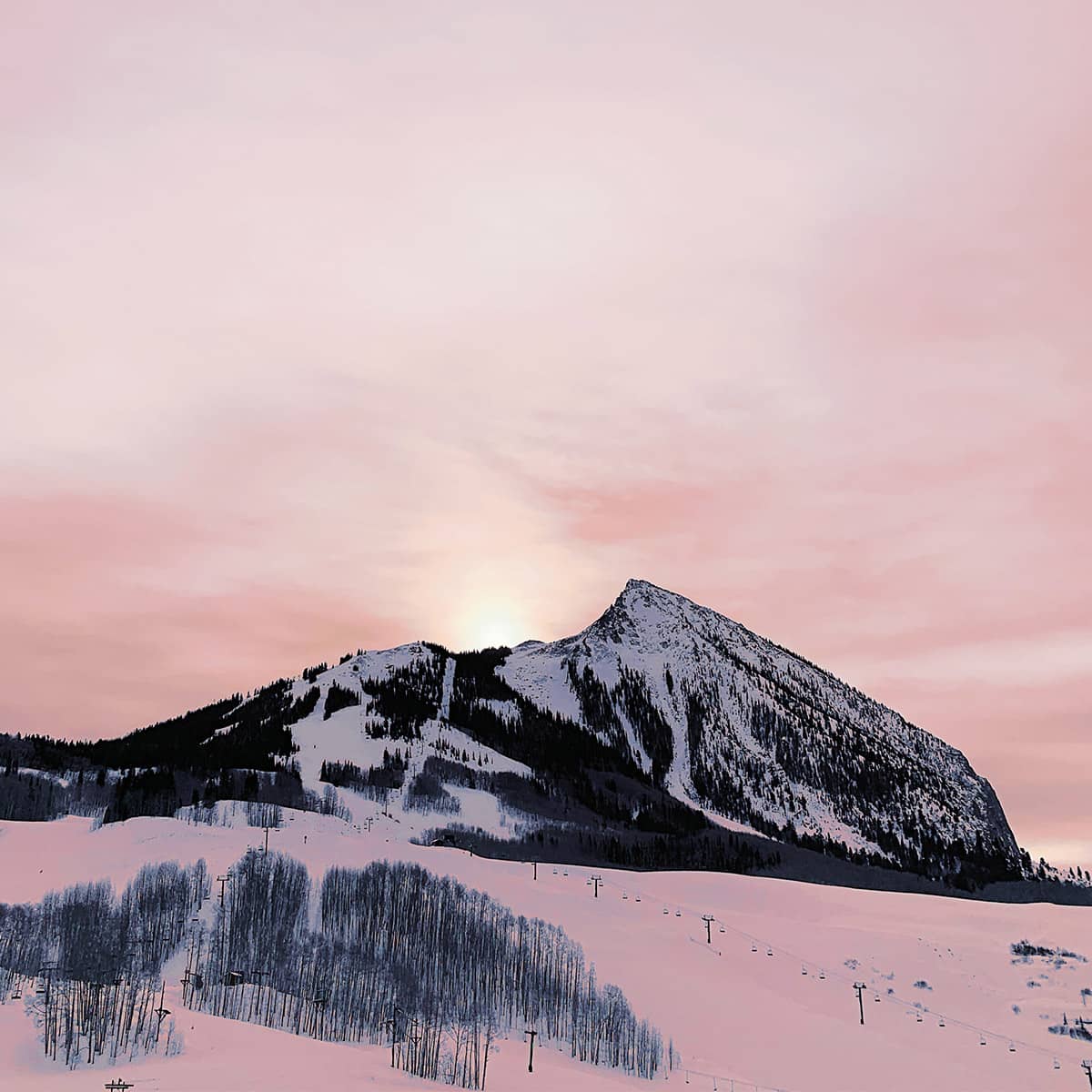 Photo of ski hill at sunset