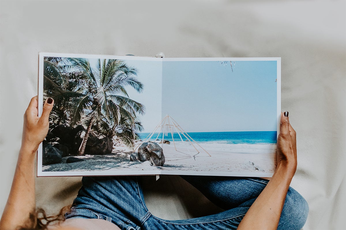 Signature Layflat album opened to two-page panoramic image of beautiful coastal altar