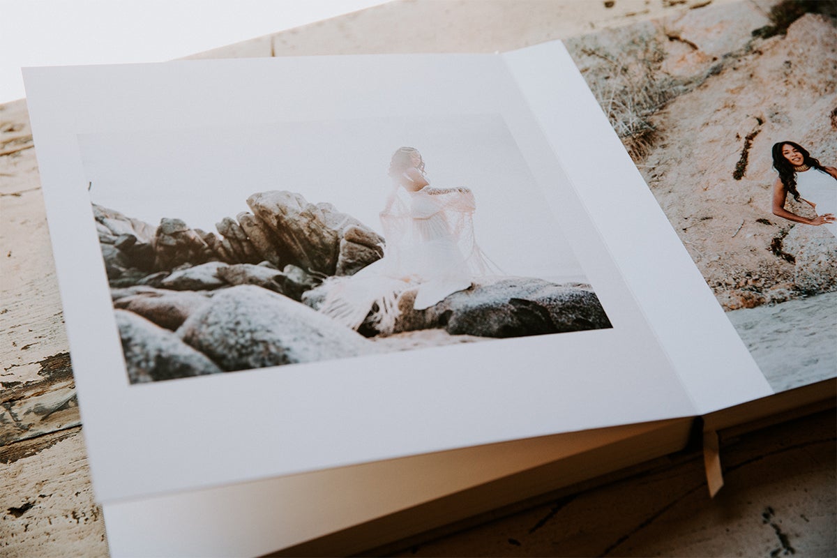 Signature Layflat Album opened to posed photo of bride