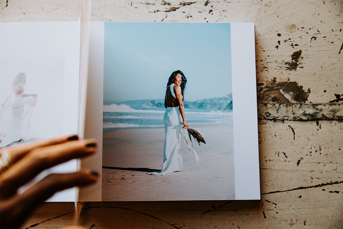 Signature Layflat Album opened to posed photo of bride