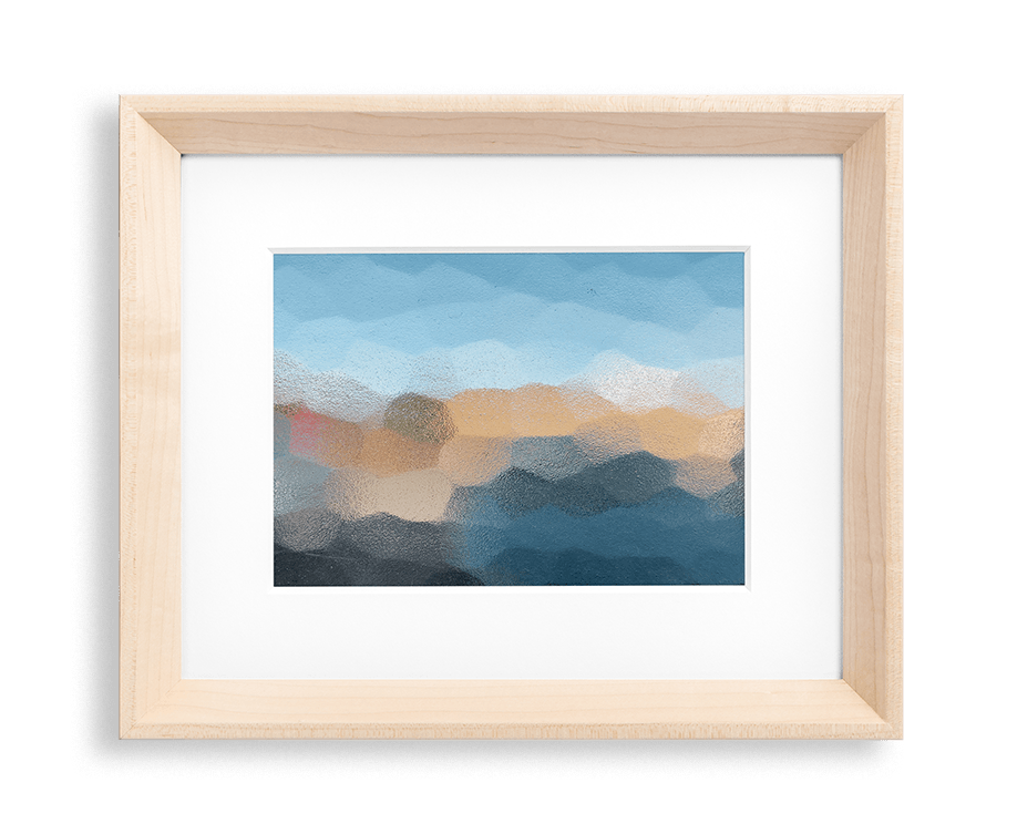 A tile-like design with predominantly black, blue, and orange coloring framed in a light wood frame