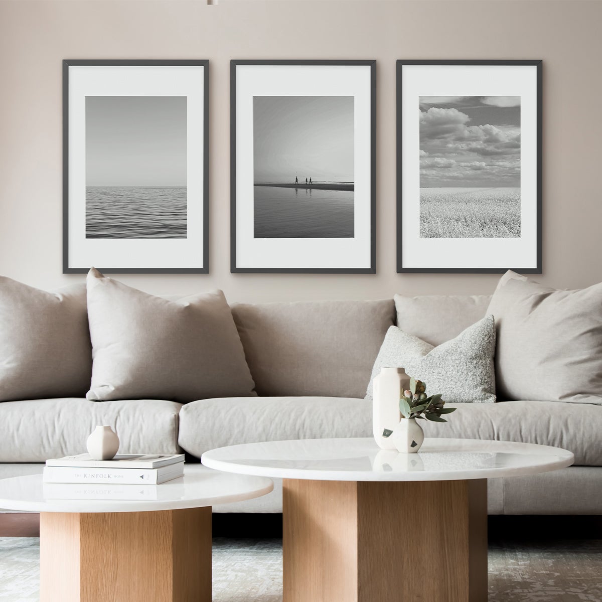 Three identical Artifact Uprising Modern Metal Frames hung in horizontal succession with different photos featuring similar hues