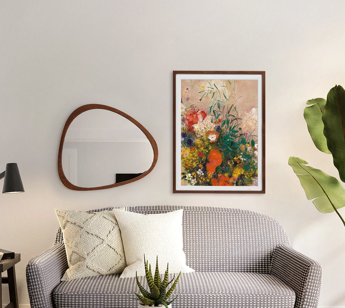 Large Artifact Uprising Gallery Frame featuring print of a coloful painting hung on wall next to organically shaped mirror