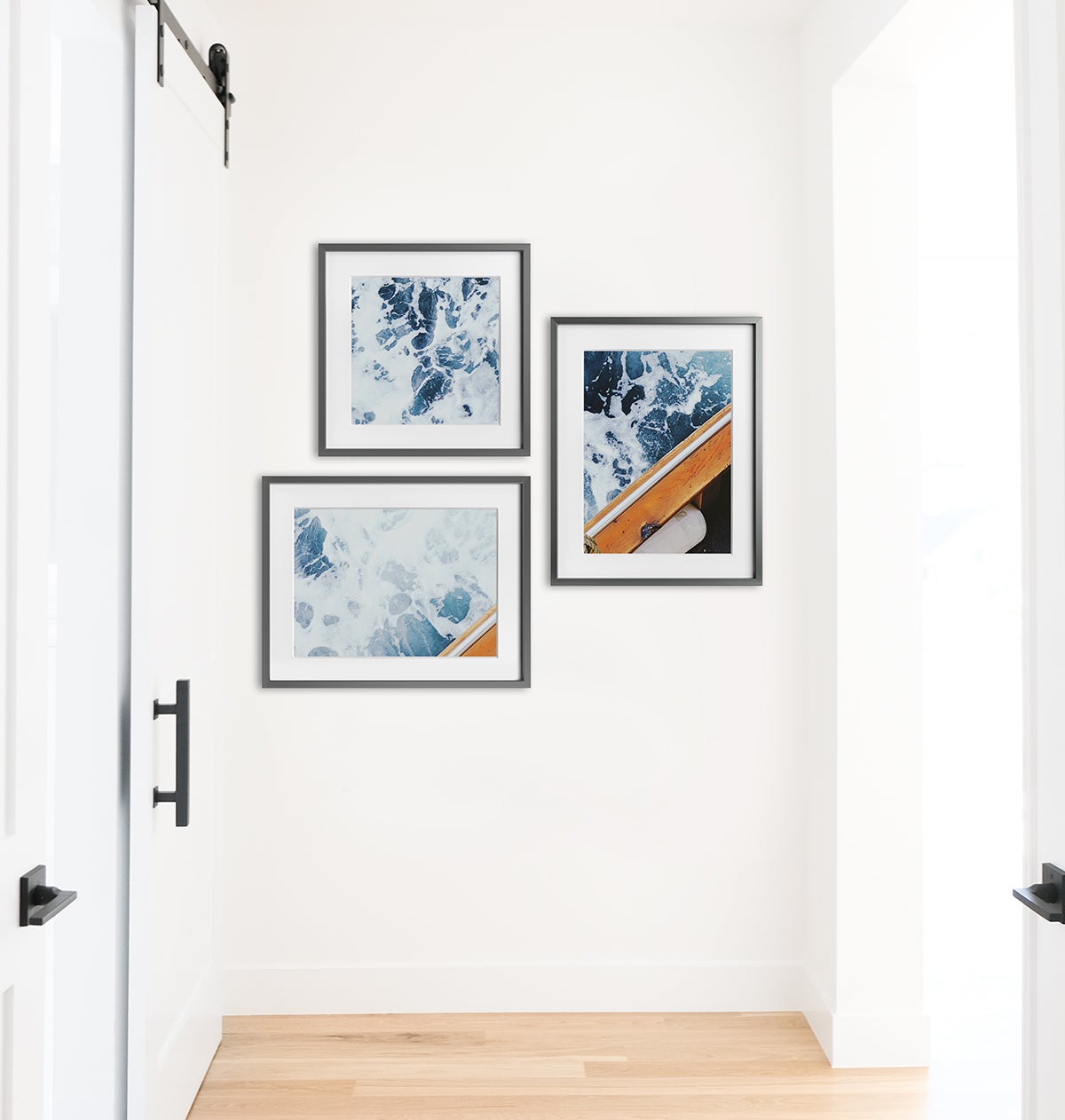 Artifact Uprising Gallery Frames arranged as a triptych gallery wall featuring photo of oars in water