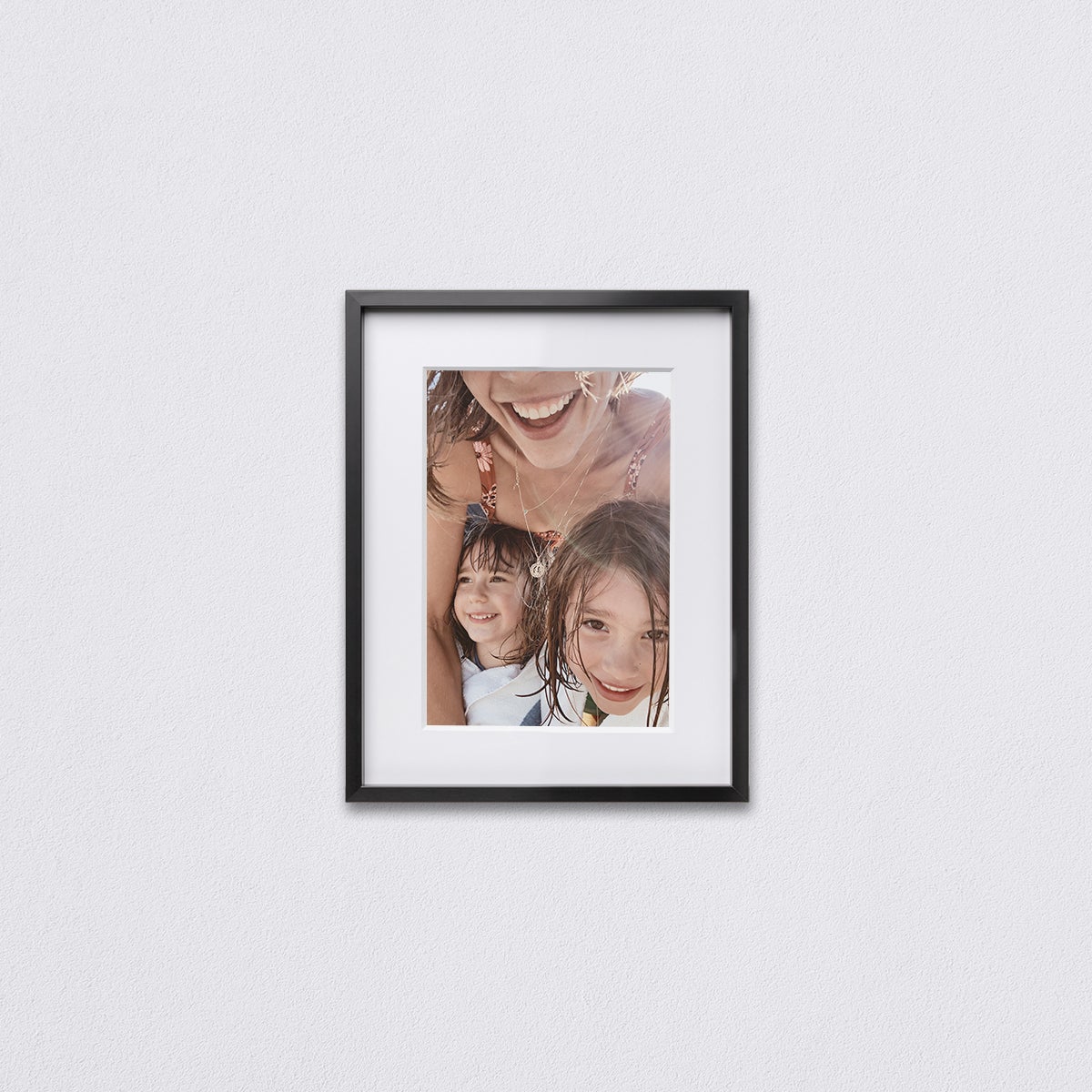 11 x 14 inch Artifact Uprising Modern Metal Frame featuring selfie of mom and two kids matted to 8 x 11 inch
