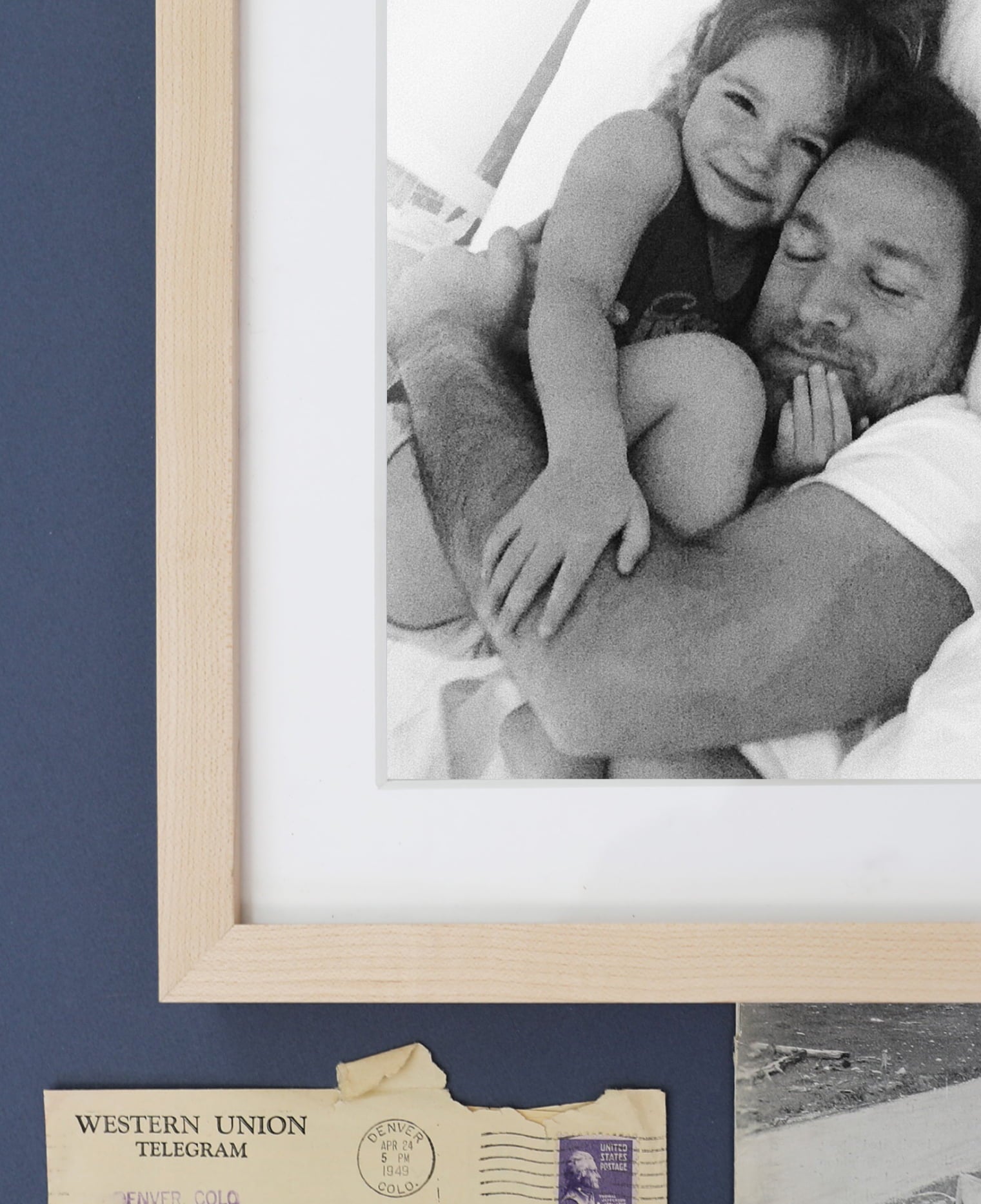 Gallery Frame showcasing photo of father lovingly holding child