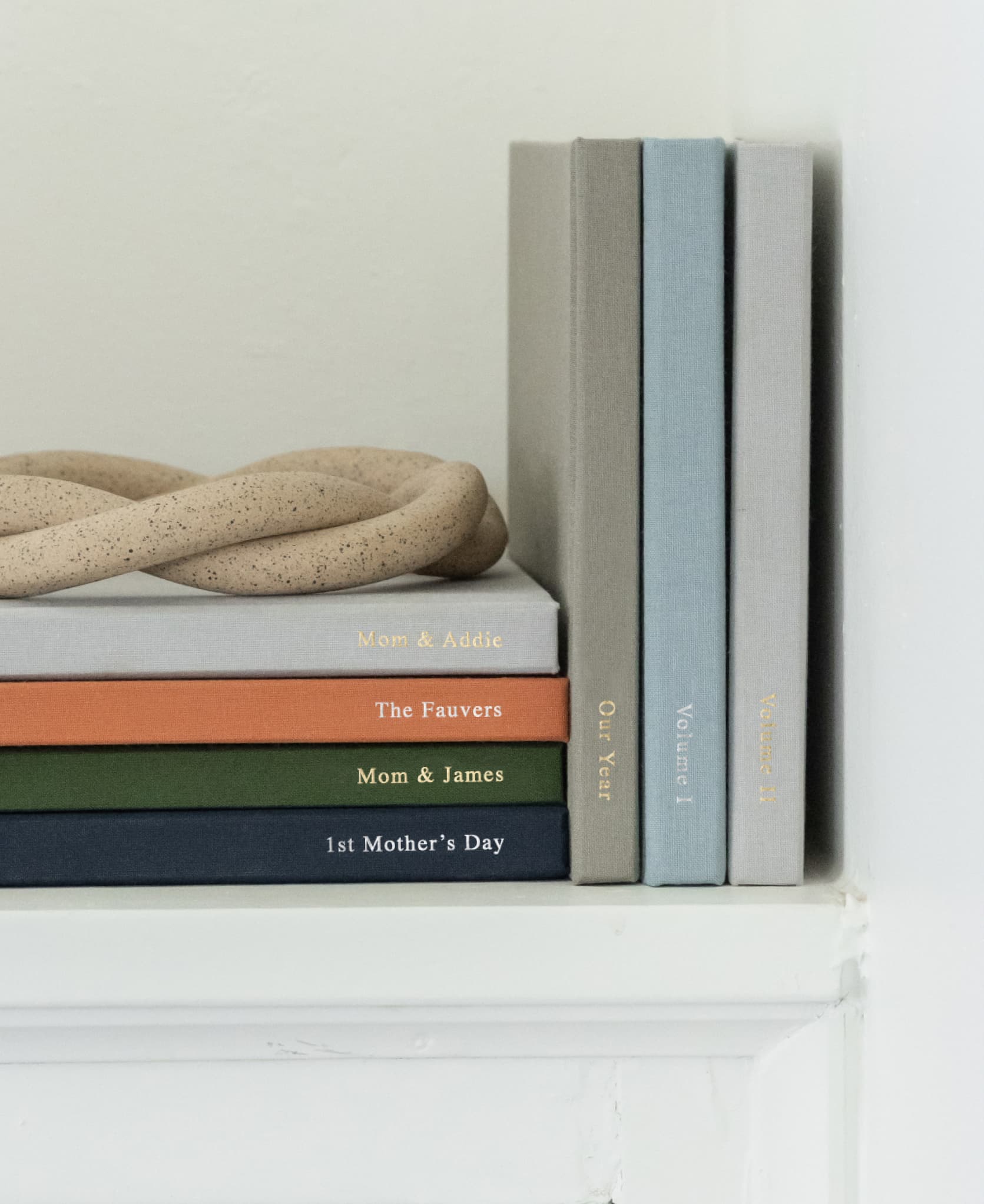Everyday Photo Books stack in shelf on display