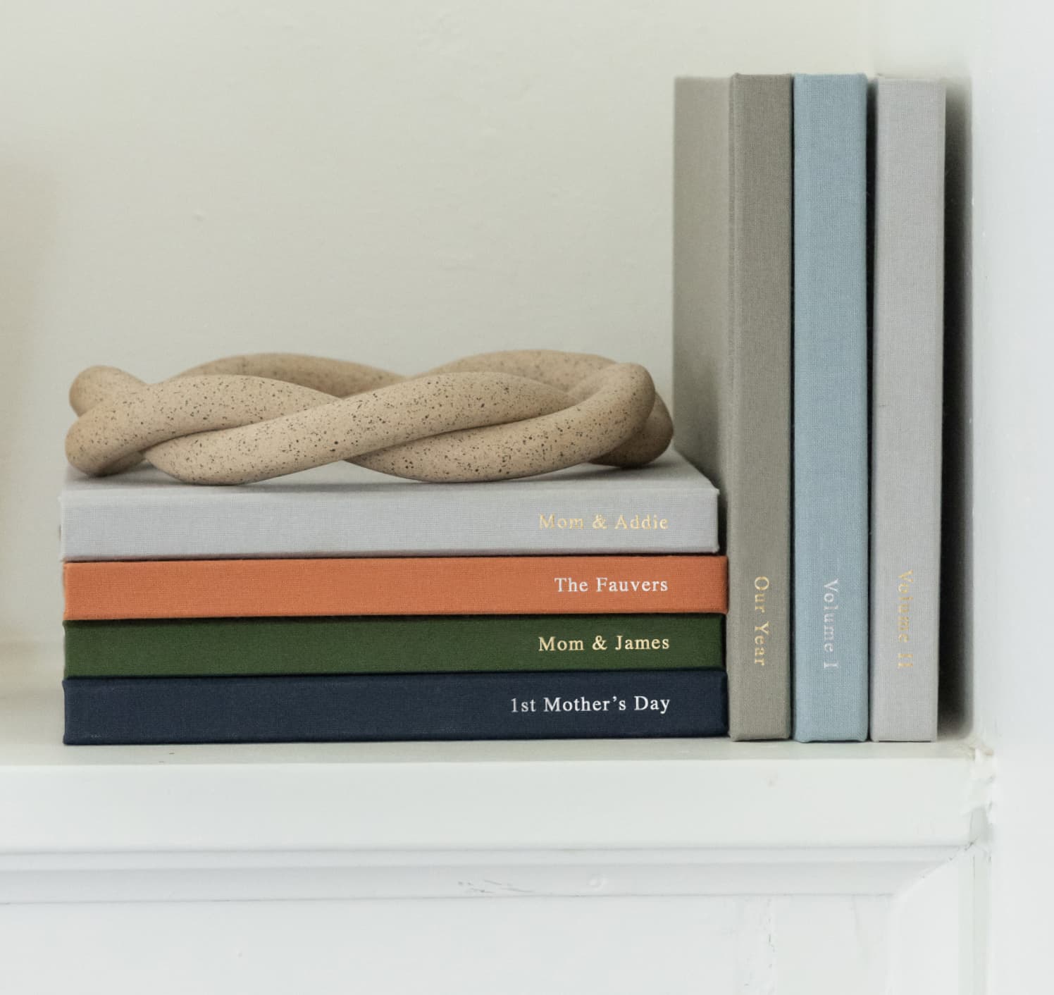 Everyday Photo Books stack in shelf on display