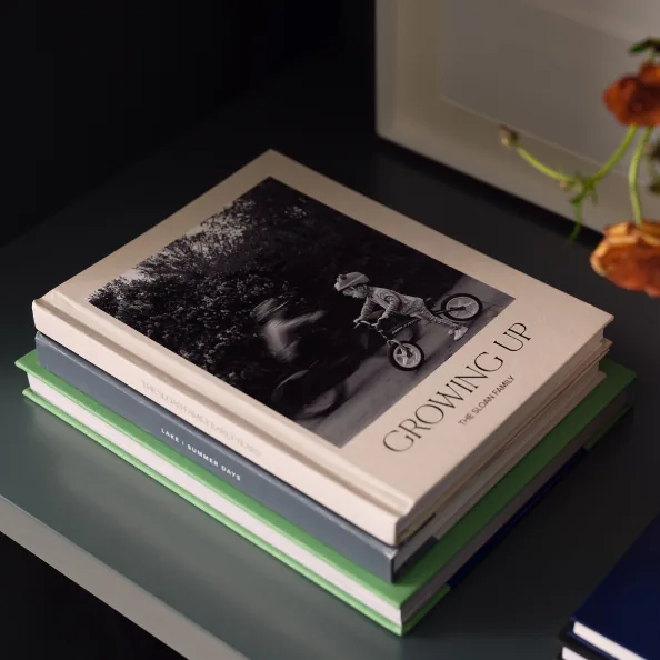 A stack of custom photo books