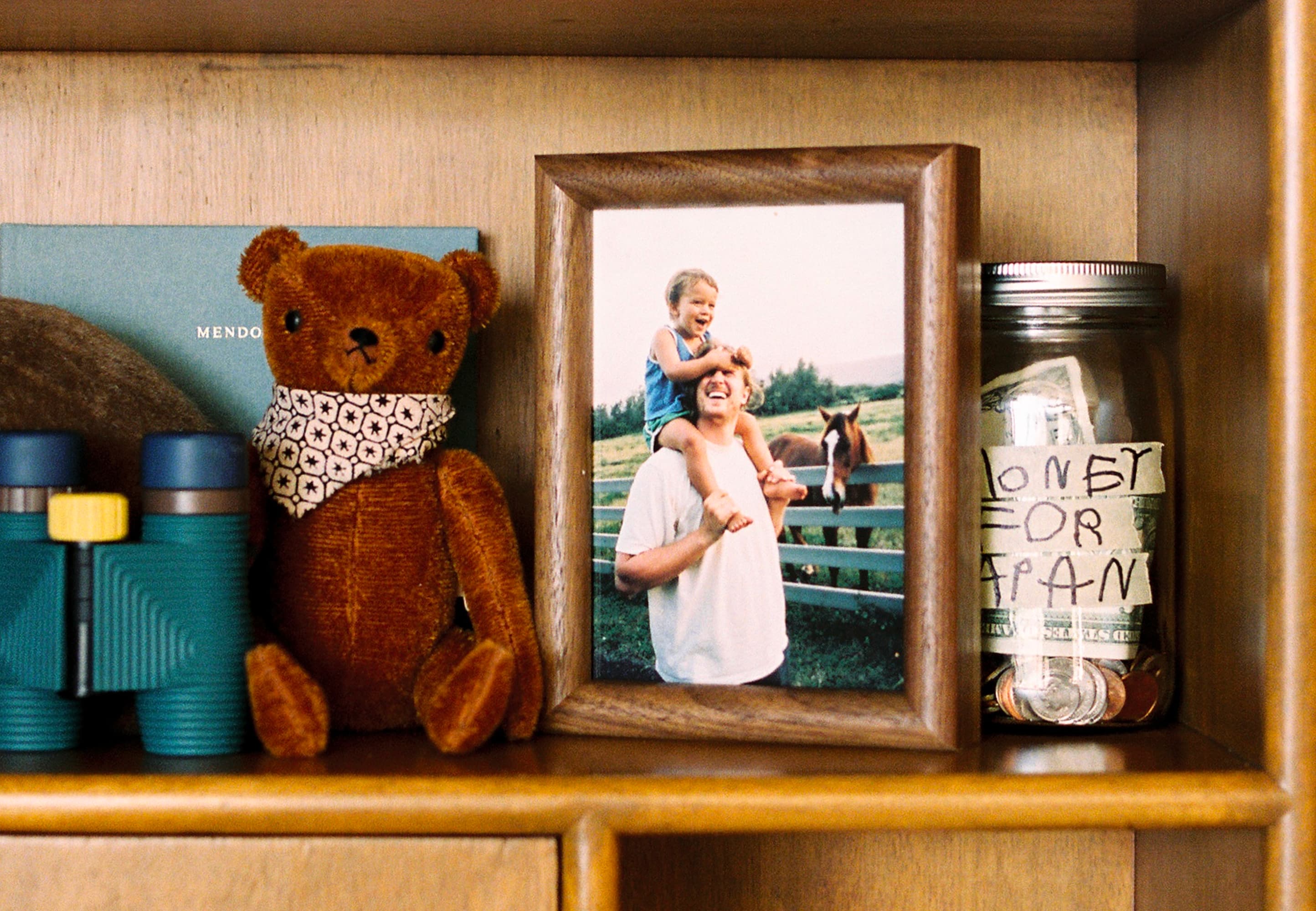 Father's Day framed photo and keepsakes on a shelf