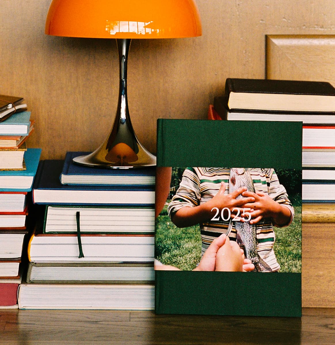 Father's Day photo books displayed on a table.