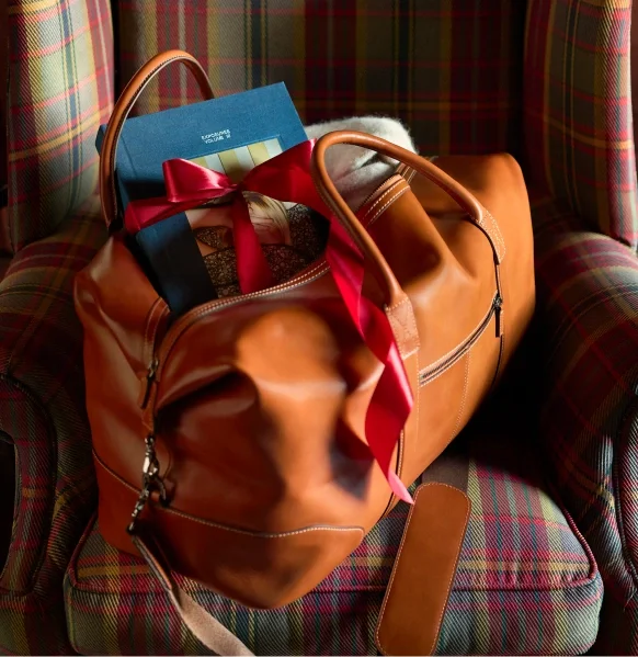 Photo gifts tucked into a holiday gift bag