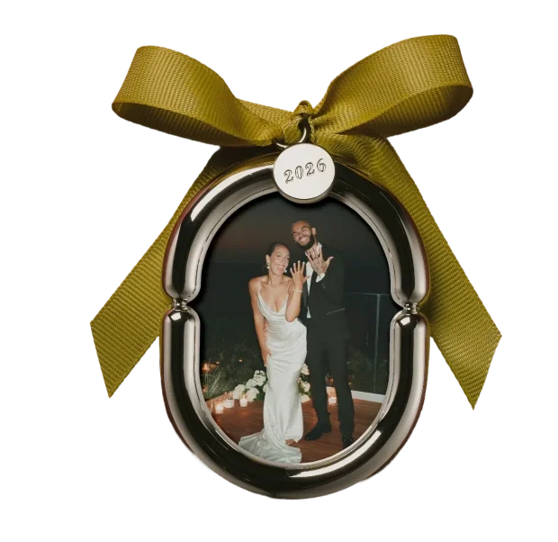 Chrome photo ornament with a gold ribbon