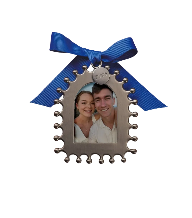 Nicho photo ornament with a blue ribbon