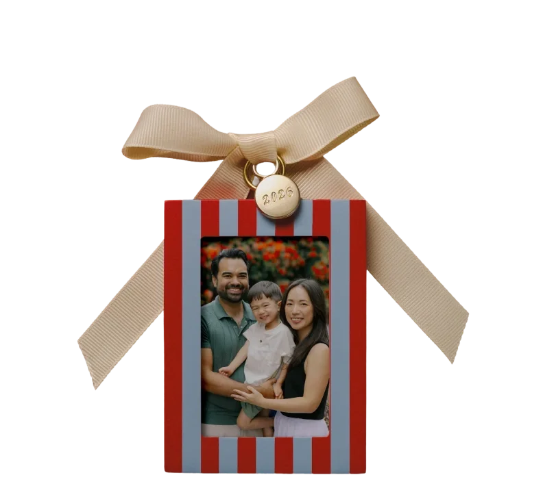 Striped wood photo ornament with an ivory ribbon