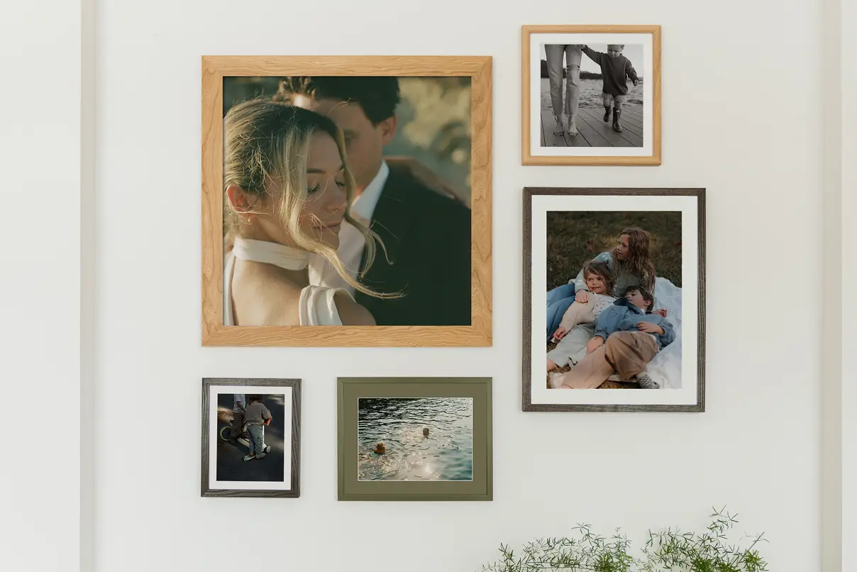 Gallery wall featuring multiple frames creating a curated gallery wall.