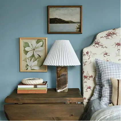 Banister Wood Frames in Oak Finish and book stack, in home bedroom.
