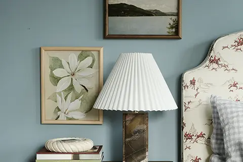 Banister Wood Frames in Oak Finish and book stack, in home bedroom.